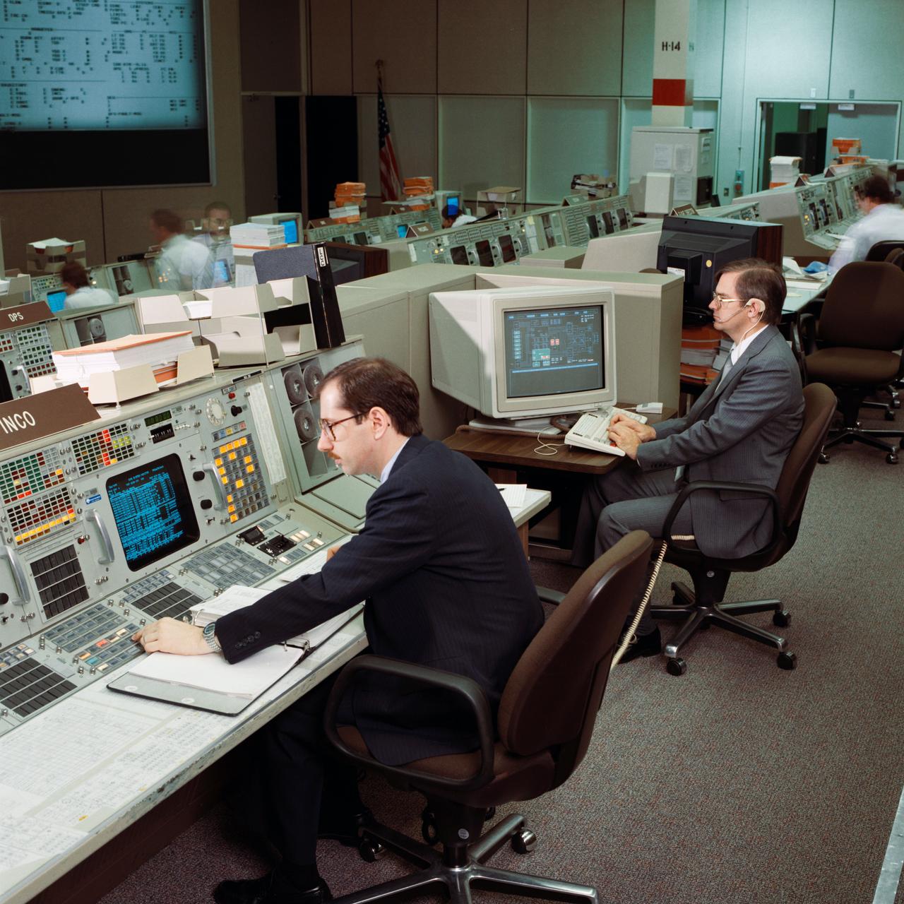 Mission control staff at consoles, 1988